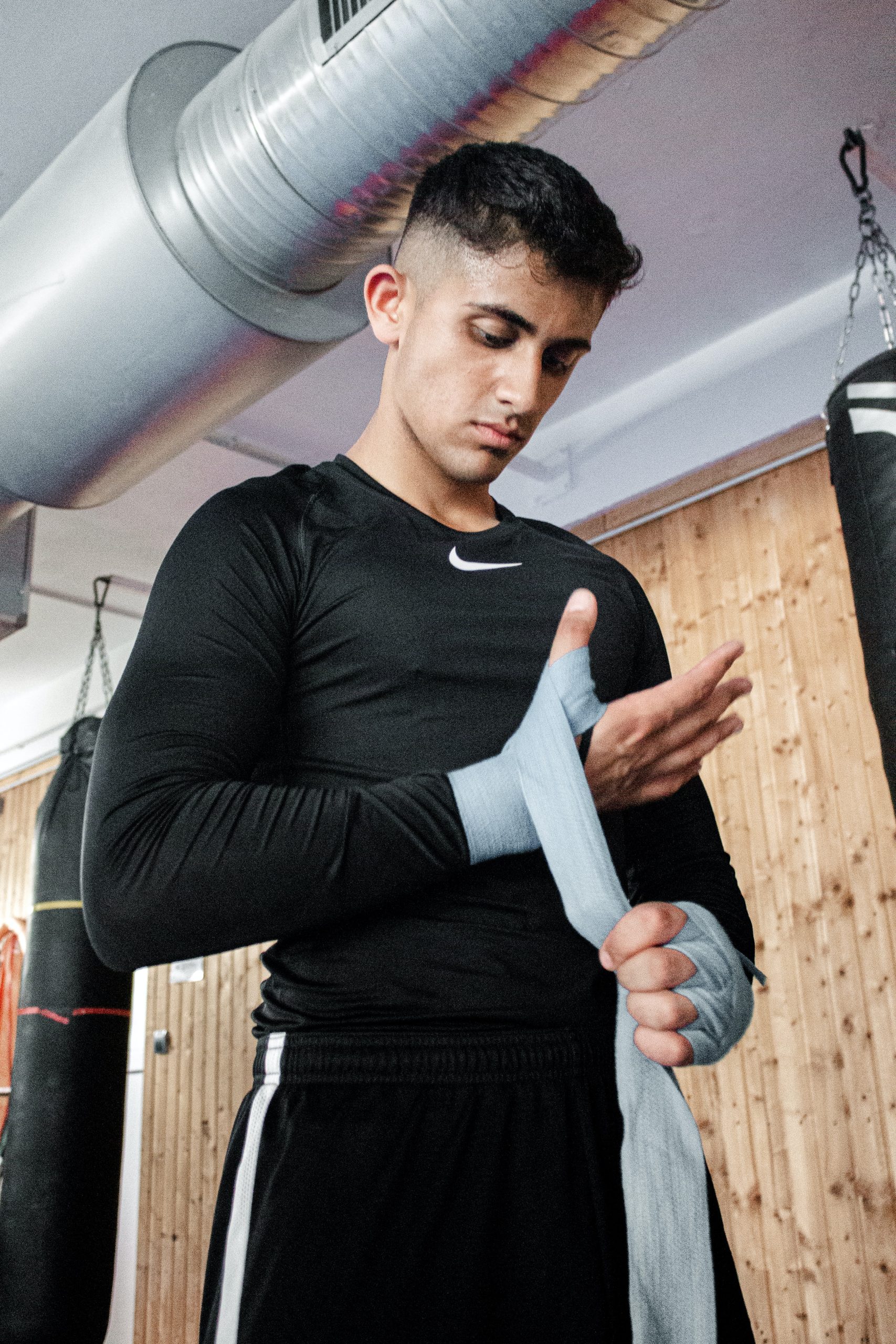 Man with boxing hand wraps