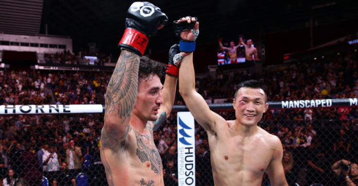 The Korean Zombie receives gift from Max Holloway